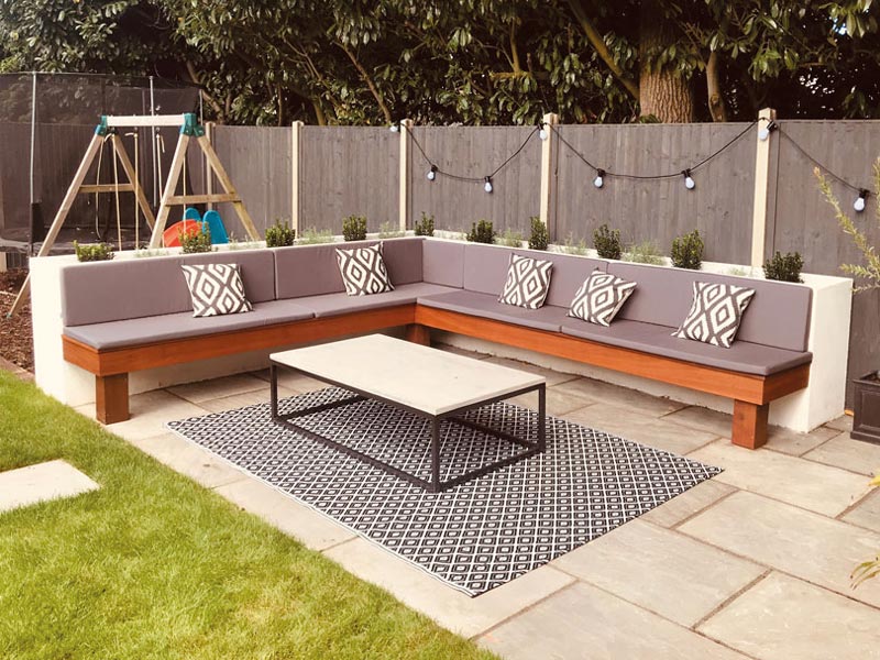 Bespoke outdoor seat and back cushions for bespoke wooden seating area