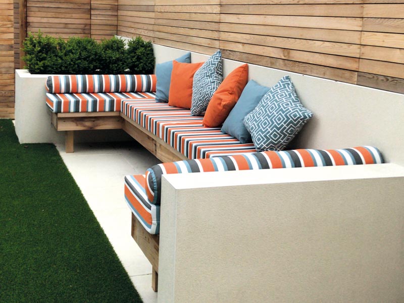 Contrasting patterned and striped outdoor cushions can give seating a very contemporary style