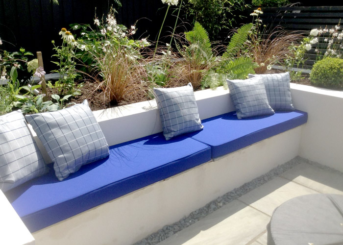 New outdoor foam cushions for a bespoke seating area with contrasting outdoor scatter cushions