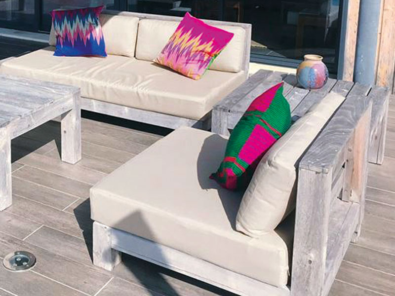 Brightly coloured and patterned outdoor scatter cushions provide an additional design feature to any outdoor seating area.