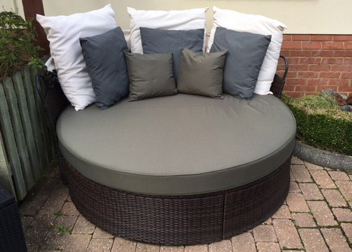 Bespoke outdoor seat, backrest and scatter cushions for an outdoor round rattan day bed/lounger
